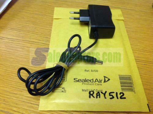 Genuine EU AC Adapter Mod No HK-008C. 9V DC 500mA